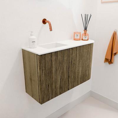 Toiletmeubel Mondiaz Joya | 71.6 cm | Meubelkleur Dusk | Faye wastafel Talc Links | Zonder kraangat(en) Toiletmeubel Mondiaz Joya | 71.6 cm | Meubelkleur Dusk | Faye wastafel Talc Links | Zonder kraangat(en)