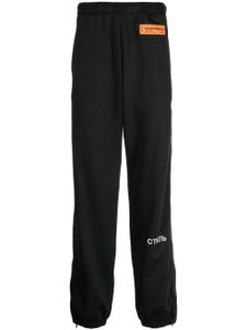 Heron Preston pantalon de jogging à logo СТИЛЬ - Noir