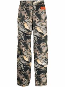 Heron Preston pantalon de jogging à imprimé camouflage - Vert