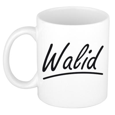 Walid Naam koffiemok - beker - met sierlijke letters - wit - 300 ml - Cadeau - Heren Walid Naam koffiemok - beker - met sierlijke letters - wit - 300 ml - Cadeau - Heren