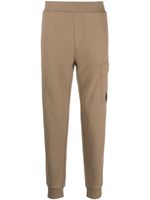 C.P. Company pantalon de jogging à patch logo - Marron