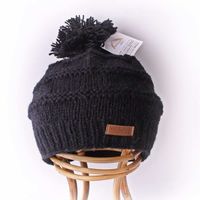 Zwarte Wollen Muts met Pompon Zwarte Wollen Muts met Pompon