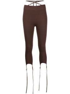 ANDREĀDAMO legging crop à détail de sangle - Marron