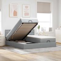 Ottoman bed met matrassen en LED's 180x200cm stof lichtgrijs