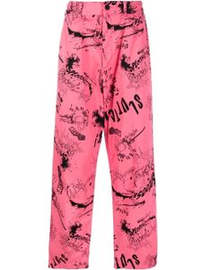 Comme Des Garçons Shirt pantalon droit à imprimé graffiti - Rose