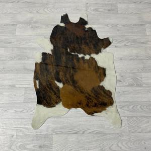 Kleine koeienhuid bruin zwart wit 90x60cm