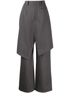 Goen.J pantalon en serge à design superposé - Gris