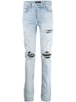 AMIRI jean slim à effet usé - Bleu