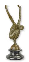 A BRONZE SCULPTURE OF A MALE NUDE IN DIVING POSITION