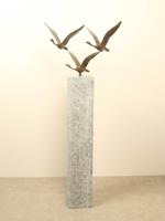 3 bronzen zwanen