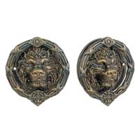 A CAST IRON LION HEAD DOOR KNOCKER