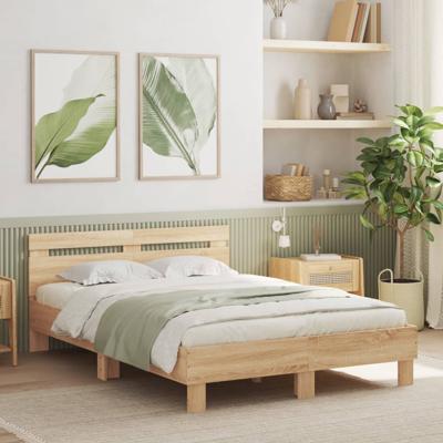 Bedframe met hoofdeinde en LED sonoma eikenkleurig 135x190 cm