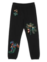 Stella McCartney Kids pantalon de jogging en coton à fleurs brodées - Noir