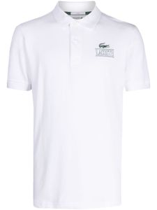 Lacoste polo à logo imprimé - Blanc