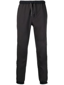 Patagonia pantalon de jogging à logo imprimé - Noir