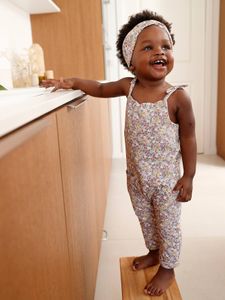 Set jumpsuit en haarband babymeisje van molton lichtroze