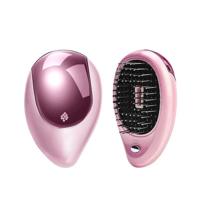 Draagbare elektrische haar Ionische borstel stijltang borstel negatieve Ion kam anti-statische massage mini steil haar kam (roze)