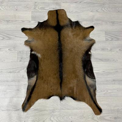 Geitenhuid bruin zwart wit 85x65cm