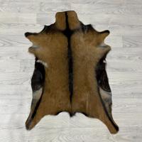 Geitenhuid bruin zwart wit 85x65cm