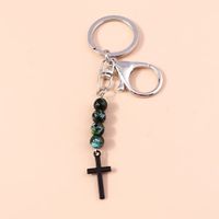 Kruis sleutelhanger met gekleurde obsidiaan - Sleutelhangers - Spiritueelboek.nl - thumbnail