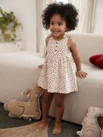 Gedrukte babyjurk met schouderbandjes vanille Gedrukte babyjurk met schouderbandjes vanille
