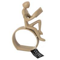 Beeld boek zittend beige Beeld boek zittend beige