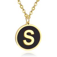 Goudkleurige Dames Schakelketting met Zwarte Kettinghanger Letter S