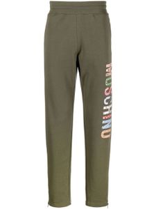 Moschino pantalon de jogging à logo imprimé - Vert