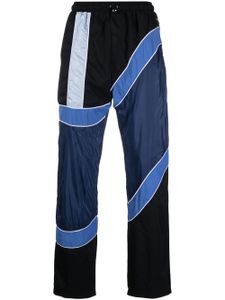 Ahluwalia pantalon rayé à design colour block - Bleu