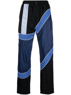 Ahluwalia pantalon rayé à design colour block - Bleu