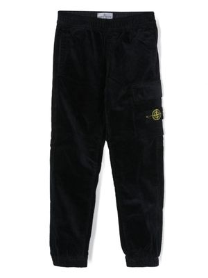 Stone Island Junior pantalon en velours côtelé à patch logo - Bleu