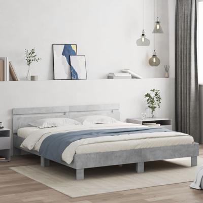 Bedframe met hoofdeinde en LED-licht betongrijs 200x200 cm