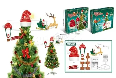 Ronddraaiende Kerstboom Piek Kerstmuts