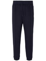 Emporio Armani pantalon de jogging à coupe fuselée - Bleu