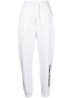 Tommy Jeans pantalon de jogging à logo imprimé - Blanc