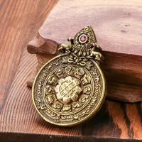 Boeddhistisch amulet met 12 zodiac tekens van koper - Tibetaanse sieraden - Spiritueelboek.nl - thumbnail