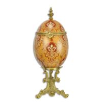 A BRONZE MOUNTED PORCELAIN EGG SHAPED BOX