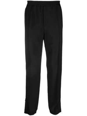 Versace pantalon de jogging à chevilles zippées - Noir