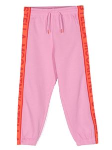 Stella McCartney Kids pantalon de jogging fuselé à logo imprimé - Rose