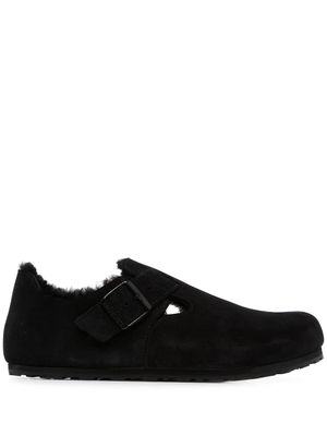 Birkenstock chaussons London à bordure en peau lainée - Noir
