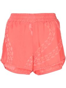 Stella McCartney short en soie à imprimé graphique - Rose