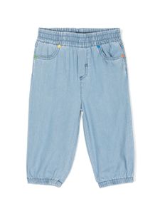 Stella McCartney Kids jean à imprimé Sunshine Face - Bleu