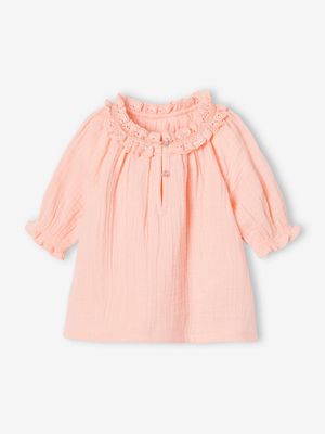 Babyblouse van katoengaas koraal