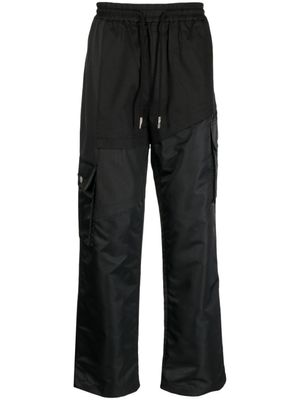 Feng Chen Wang pantalon ample à lien de resserrage - Noir