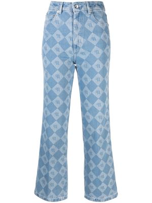 Nanushka jean évasé Zoey à motif monogrammé - Bleu