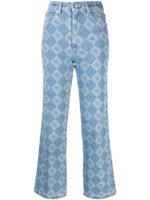 Nanushka jean évasé Zoey à motif monogrammé - Bleu