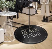 Rond zwarte Black Friday tapijt witte letters
