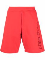 Alexander McQueen short à logo imprimé - Rouge