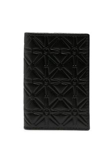 Comme Des Garçons Wallet porte-cartes à motif géométrique embossé - Noir