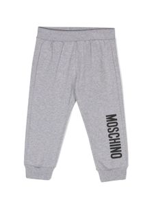 Moschino Kids pantalon de jogging en coton à logo imprimé - Gris